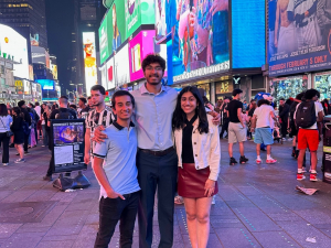 Shah, Ghanta, and Jotsinghani in New York City's historic Time Square.