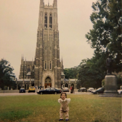 Camila at age three (3) in front of the Chapel.